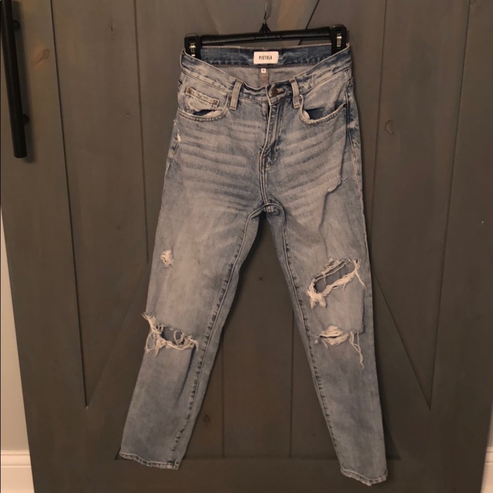 Woman’s mom jeans hardly worn.